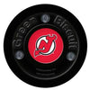Green Biscuit NHL Team Hockey Puck - HockeyShot