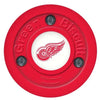Green Biscuit NHL Team Hockey Puck - HockeyShot